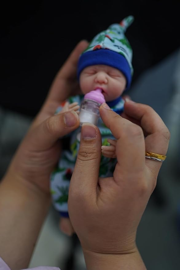 7 Inch Mini Silicone Baby, Reborn Baby Dolls Silicone Full Body Boy Eric, Realistic Newborn Baby Doll Real Life Miniature Baby Doll with Feeding Accessories