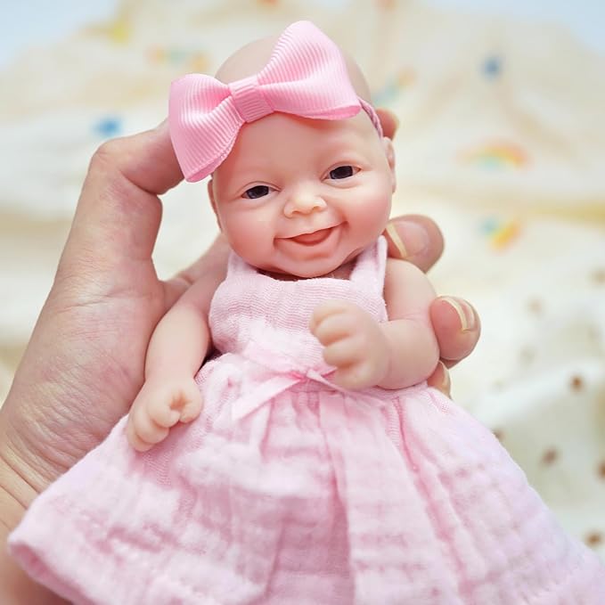 7" Reborn Babies Silicone Full Body Micro Realistic Newborn Doll Lifelike Eyes Open Smile Baby Girl Looking Real with Pink Dress Accessories for Kids Birthday Gift