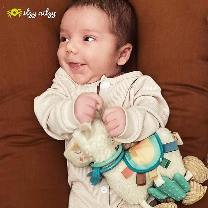 Itzy Ritzy Link & Love Toy for Stroller or Car Seat; Features Textured Ribbons, Crinkle Sounds, Clinking Rings & Silicone Teether; Designed For Ages 0 Months and Up (Llama)