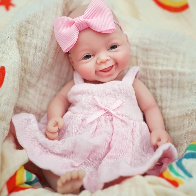 7" Reborn Babies Silicone Full Body Micro Realistic Newborn Doll Lifelike Eyes Open Smile Baby Girl Looking Real with Pink Dress Accessories for Kids Birthday Gift