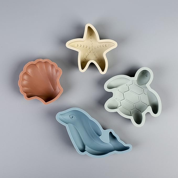 BLUE GINKGO Silicone Beach Toys - Modern Baby Travel Friendly Beach Set | Bucket, Shovel, 4 Sand Molds, Bag | Sand Toys for Toddlers, Kids - 7pc (Beige)