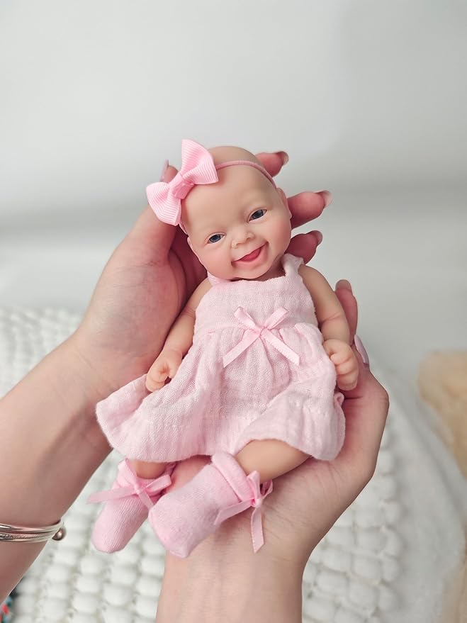 7" Reborn Babies Silicone Full Body Micro Realistic Newborn Doll Lifelike Eyes Open Smile Baby Girl Looking Real with Pink Dress Accessories for Kids Birthday Gift