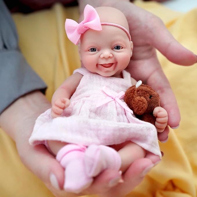 7" Reborn Babies Silicone Full Body Micro Realistic Newborn Doll Lifelike Eyes Open Smile Baby Girl Looking Real with Pink Dress Accessories for Kids Birthday Gift