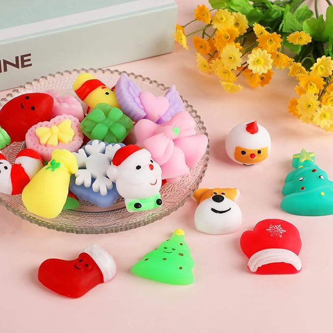 KINGYAO Squishy Fidget Toys, Mini Mochi Squishies 24 Pcs Party Christmas Mochi Favors for Kids Kawaii Snow Man Squishy Stress Relief Toys with Storage Box