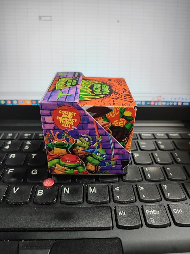 SHASHIBO Teenage Mutant Ninja Turtles Shape Shifting Box - STEM Magnetic Fidget Cube That Transforms Into Over 70 Shapes, Download Fun in Motion Toys Mobile App (Mikey)