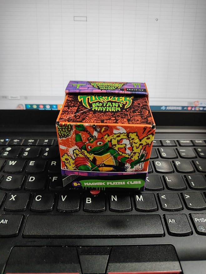 SHASHIBO Teenage Mutant Ninja Turtles Shape Shifting Box - STEM Magnetic Fidget Cube That Transforms Into Over 70 Shapes, Download Fun in Motion Toys Mobile App (Mikey)