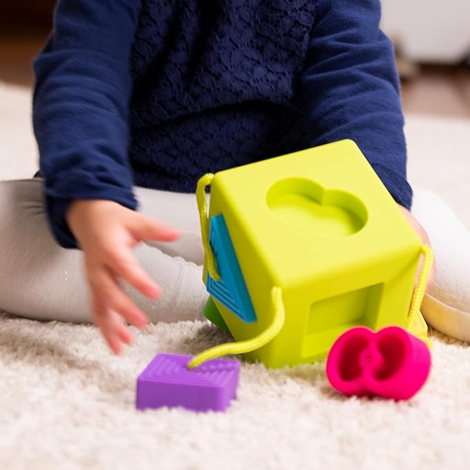 Fat Brain Toys OombeeCube, Toddler and Baby Toys 10 Months and Up, Travel-Friendly Shape Sorter with Tethered Shapes for Early Learning