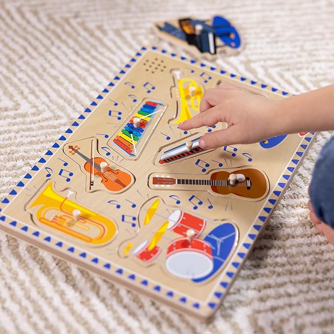 Melissa & Doug Musical Instruments Sound Puzzle - Wooden Peg Puzzle with Light-Activated Sound Effects (8 pcs) Wooden Peg Baby Music Learning Toys, for Toddlers and Preschoolers Ages 2+