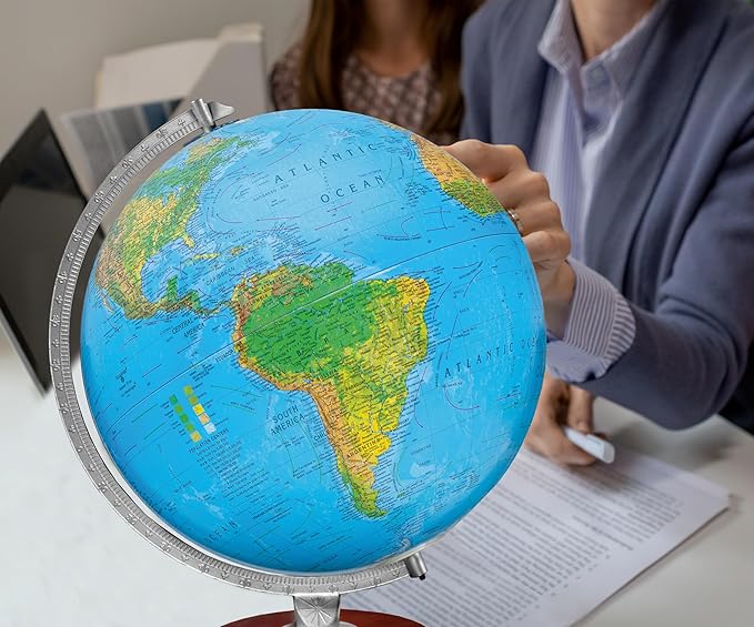 Standard Illuminated 12" Diameter Globe, USA Cartography with Walnut Finished Hardwood Base and Blue Ocean Globe Ball. A sleek walnut finished hardwood base and silver riser offer a perfect contrast to this beautiful geographic piece. When illuminated,...