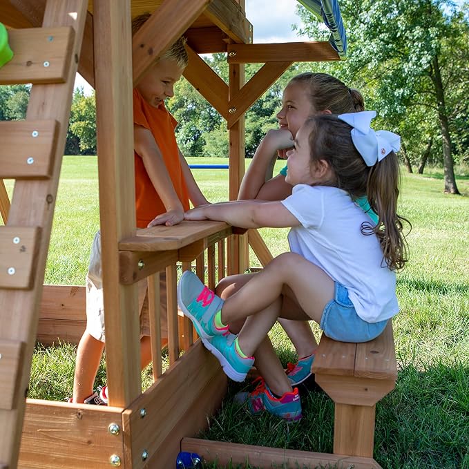 Backyard Discovery Beach Front Cedar Wood Swing Set with Wave Slide, Play Deck, Monkey Bars, Rock Wall Ladder, Shaded Picnic Area, Snack Bar, Belt Swings, Trapeze, Sandbox Area, Outdoor Playset