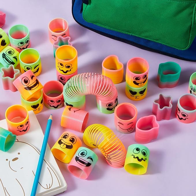 JOYIN 60 Pcs Spring Rainbow Party Favor, Mini Plastic Coil Spring Toy, Fidget Stress Coil Mini Springs Bulk Toys for Carnival Prize Birthday, Halloween Goodie Bag Stuffers