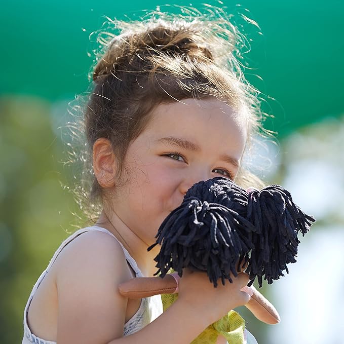 HABA Cari 12" Black Baby Doll with Black Pigtails, Embroidered Face, Removable Green Dress, Machine Washable Soft Baby Doll - 18 Months+