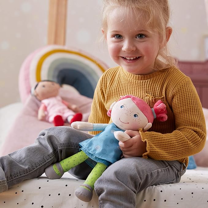 HABA Snug Up Philine - 10" Soft Doll with Embroidered Face, Pink Pigtail and Removable Blue Dress - Machine Washable - Perfect First Doll and Stuffed Cuddle Companion for 18 Months and Up