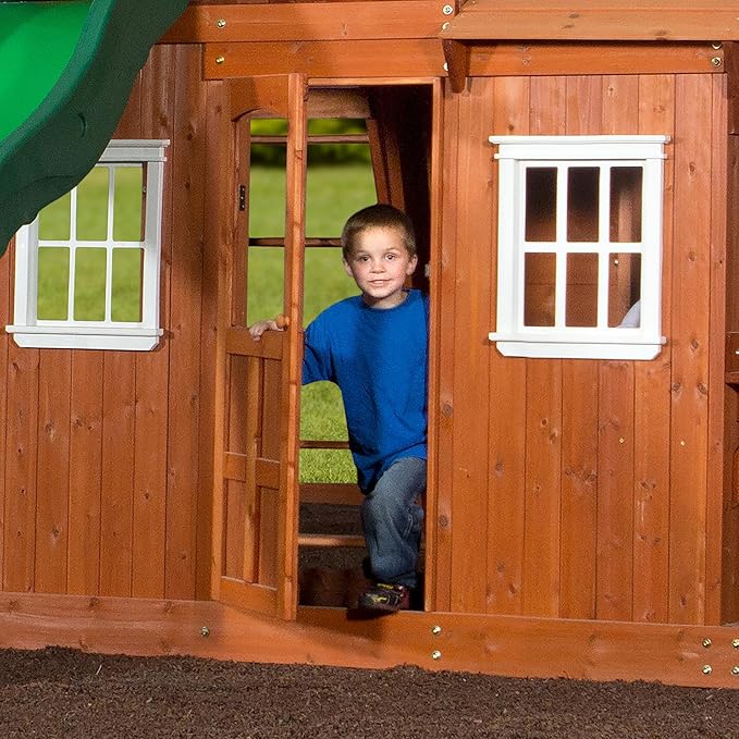 Backyard Discovery Shenandoah Cedar Wood Swing Set with Wave Slide, Raised Clubhouse, Playhouse, Play Kitchen, Belt Swings, Trapeze, Rock Wall, Ladder, Picnic Table, Full Door, Outdoor Playset