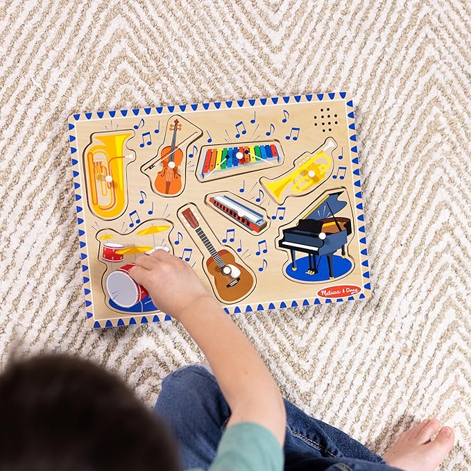 Melissa & Doug Musical Instruments Sound Puzzle - Wooden Peg Puzzle with Light-Activated Sound Effects (8 pcs) Wooden Peg Baby Music Learning Toys, for Toddlers and Preschoolers Ages 2+