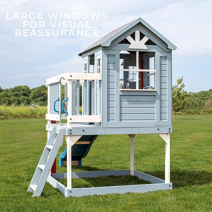 Backyard Discovery Beacon Heights Elevated Cedar Wooden Kids Playhouse with Wave Slide, Play Kitchen, Wrap-Around Deck, Flat-Step Ladder, Half Door, Windows, Bell, and Growth Chart for Outdoor Play