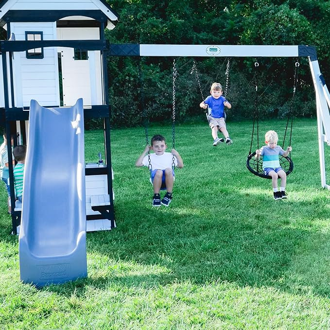 Backyard Discovery Canyon Creek White Cedar Wood Swing Set with Wave Slide, Clubhouse, Play Kitchen, Picnic Area, Belt Swings, Web Swing, Rock Wall, Balconies, Playhouse, Step Ladder, Outdoor Playset