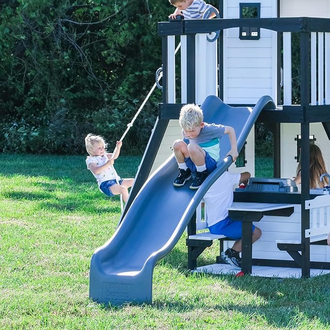 Backyard Discovery Canyon Creek White Cedar Wood Swing Set with Wave Slide, Clubhouse, Play Kitchen, Picnic Area, Belt Swings, Web Swing, Rock Wall, Balconies, Playhouse, Step Ladder, Outdoor Playset
